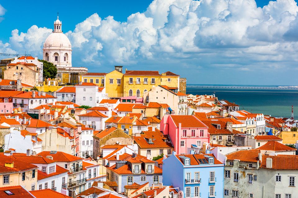 Lisbon: Guided Bike Tour, Helicopter Flight, and Boat Trip - Belém district time: Jerónimos Monastery and Belém Tower with context