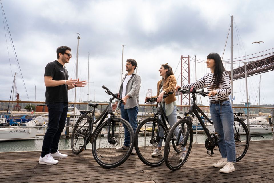 Lisbon: Guided Bike Tour, Helicopter Flight, and Boat Trip - Tagus boat trip: a calmer way to see the coastline