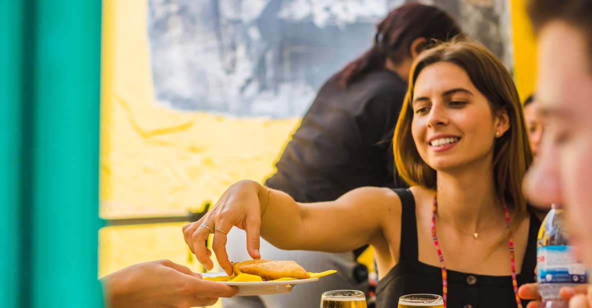 Lisbon: Guided Food and Wine Tasting Tour - Castle Quarter and Santo António: views, walking, and one last taste