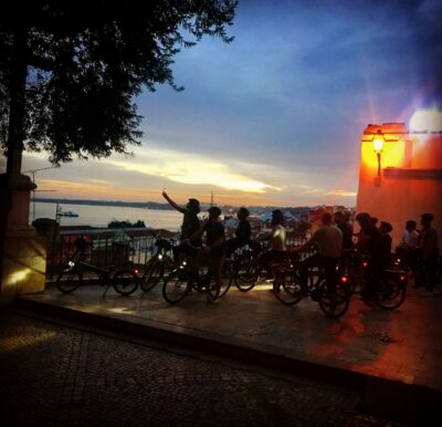 Lisbon: Guided Nighttime Electric Bike Tour - From Novo Conceito meeting spot to the first viewpoint climb