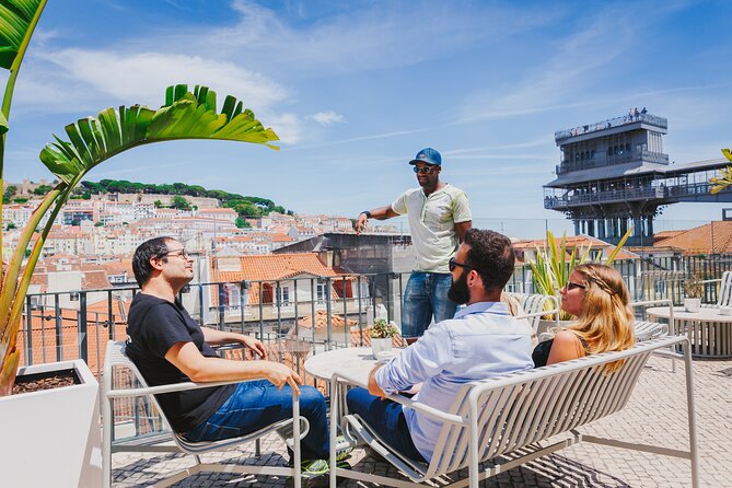 Lisbon Hidden Gems Walk: Traditions, Lunch and Ferry ride - Carmo Convent viewpoints with a beer: seeing the city in one breath