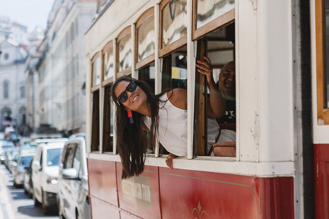 Lisbon Hills Red Tram by Tram 28 route - Starting at Praça do Comércio: Your Lisbon Baseline
