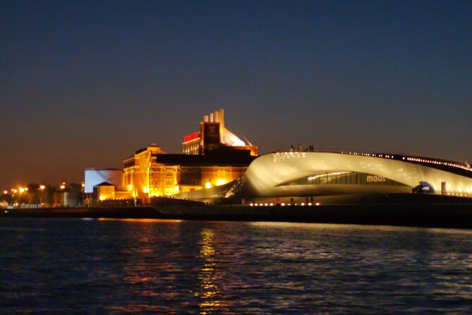 Lisbon Night Sailing Tour with a Drink- 2h Small Group Tour - From MAAT to Ajuda: the city shifts while you stay on the water