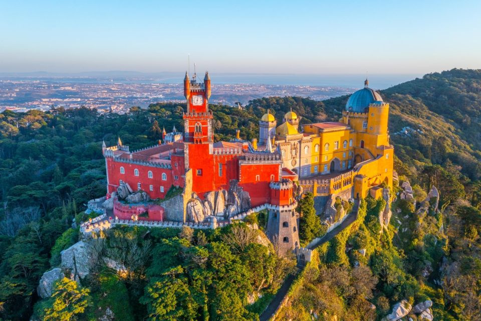 Lisbon: Pena Palace, Sintra, Regaleira, Roca, Cascais Tour - Cascais and Estoril: lunch time, coastline views, and the calmer pace