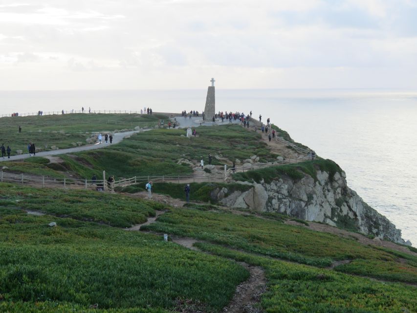 Lisbon: Pena, Regaleira & Atlantic Coast Tour with a Local - Quinta da Regaleira: Secret Tunnels, Symbols, and the Initiation Well