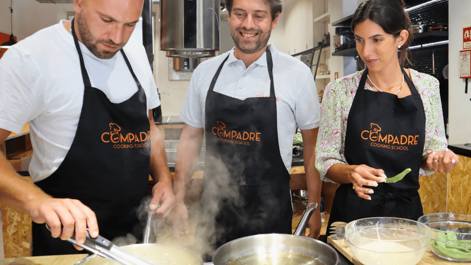 Lisbon: Portuguese street food cooking class with Drinks - Drinks included: wine with dinner, then ginja at the end