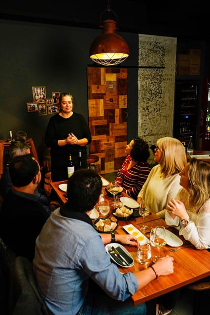 Lisbon: Premium Wine and Tapas Tasting Session - Charcuterie boards in Lisbon style: cheeses, sausages, and jams