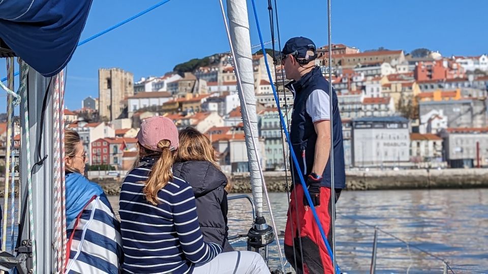 Lisbon: Private Boutique Boat Tour – Sail in Style - Onboard comfort and hands-on sailing moments