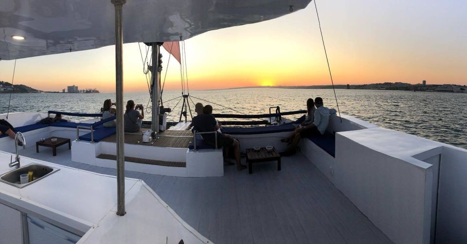Lisbon: Private Catamaran Charter for up to 18-People - Christ statue and the bridge pass: the big-photo moment from the water
