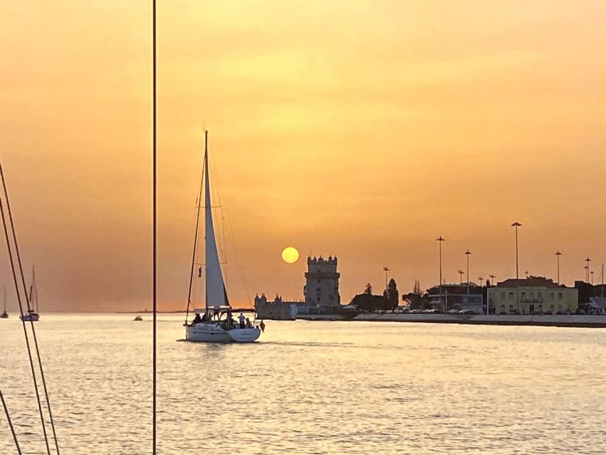 Lisbon: Private Tagus River Sunset Cruise on a Luxury Boat - 25 de Abril Bridge to Bairro Alto: engineering and hills, in one sweep