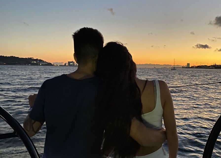 Lisbon: Private Tagus River Sunset Cruise on a Luxury Boat - Commerce Square, Castle Quarter, and Alfama: the old city curves toward you