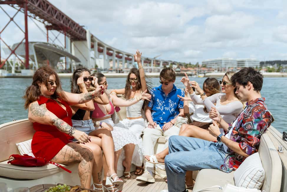 Lisbon: Relax in the Waves - Open Bar and Snacks at Sunset - Passing Under the 25 de Abril Bridge Feels Like a Movie Scene