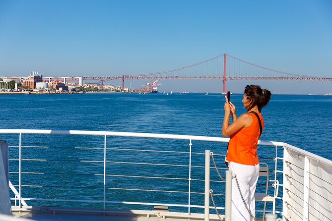 Lisbon River Boat Sightseeing Tour with a Drink - Christ the King at Almada: the statue you see from the Tagus