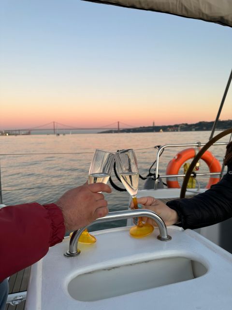 Lisbon: Romantic Cruise with Wine & Portuguese Tapas - Commerce Square and Alfama: the historic core, framed by water