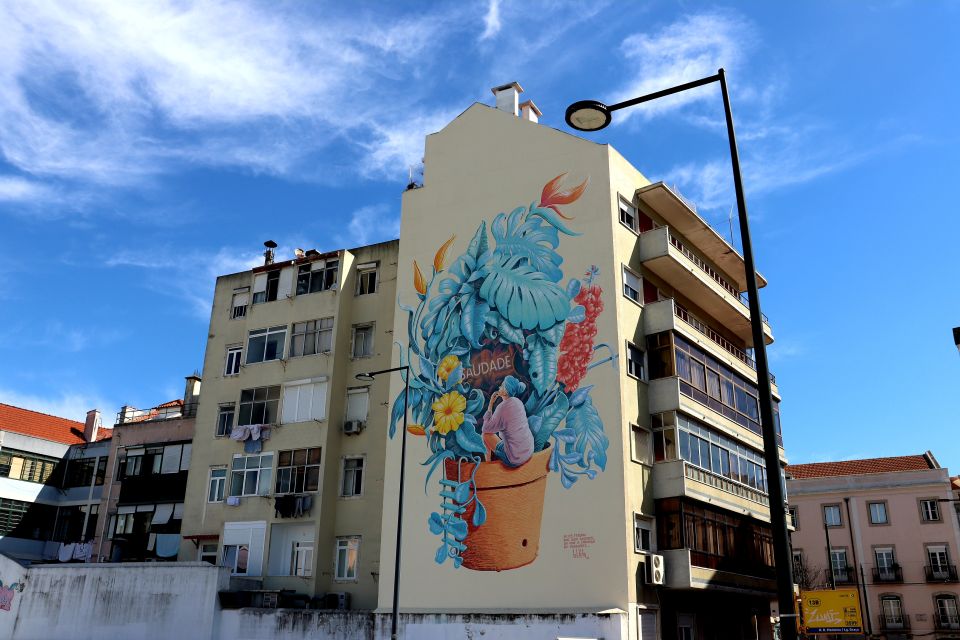 Lisbon: Street Art and Historical Walking Tour - Miradouro Portas do Sol and the Built-In Pause for Views