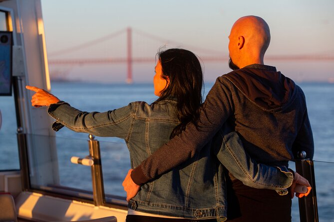 Lisbon Sunset cruise with Welcome Drink and Snack included - The river route: Praça do Comércio, the bridge, and Belem’s icons from water level