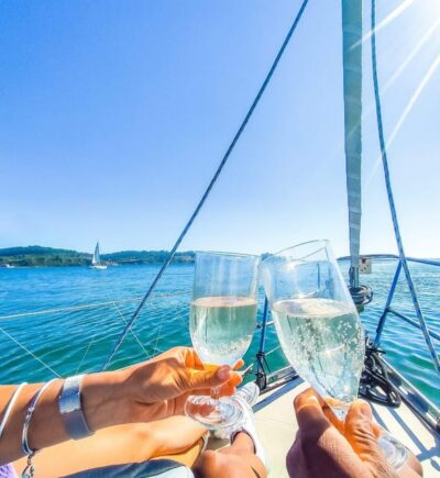 Lisbon: "Sunset" & "Day Tours" by boat, with drink and music - 25 de Abril Bridge to Christ the King: Big Views, Clear Angles