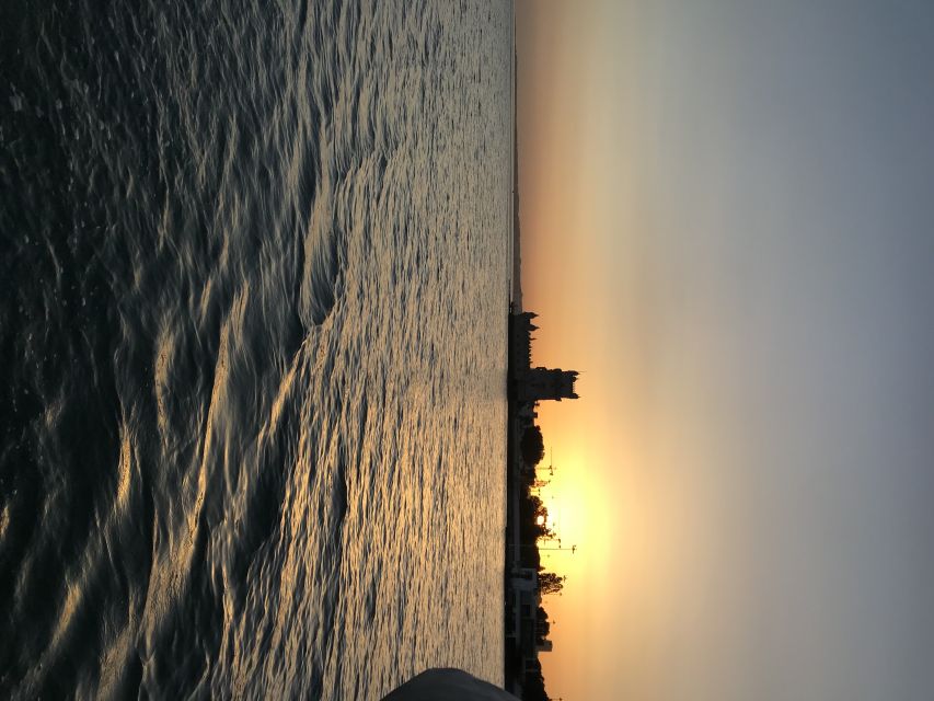 Lisbon Sunset Sailing – Small Group (max 10) Wine & History - Monument of the Discoveries and Praça do Comércio: the heart of Lisbon at water level