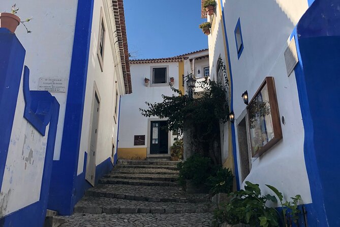 Lisbon to Fatima/Batalha/Nazare & Obidos guided tour 8pax group - Óbidos Village: medieval streets and the ginja-in-chocolate moment