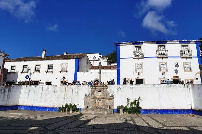 Lisbon to Porto Up To 5 Stops Óbidos Nazaré Fátima Coimbra Aveiro - Coimbra Panoramic Stop: The University View Without the Time Sink