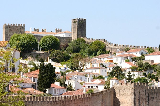 Lisbon to Porto Up To 5 Stops Óbidos Nazaré Fátima Coimbra Aveiro - Porto Drop-Off: Arriving Without the Stress