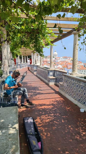 Lisbon: Tuk Tuk 2H Tour Lisbon with a Old Timer - Alfama: old streets, crafts, and the human scale