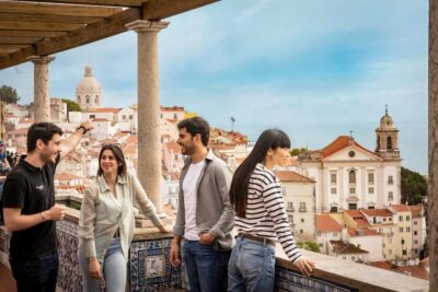 Lisbon: Walking Tour, Belém Neighborhood, Tram and Boat Ride - Walking Alfama: cathedral views and steep-street storytelling