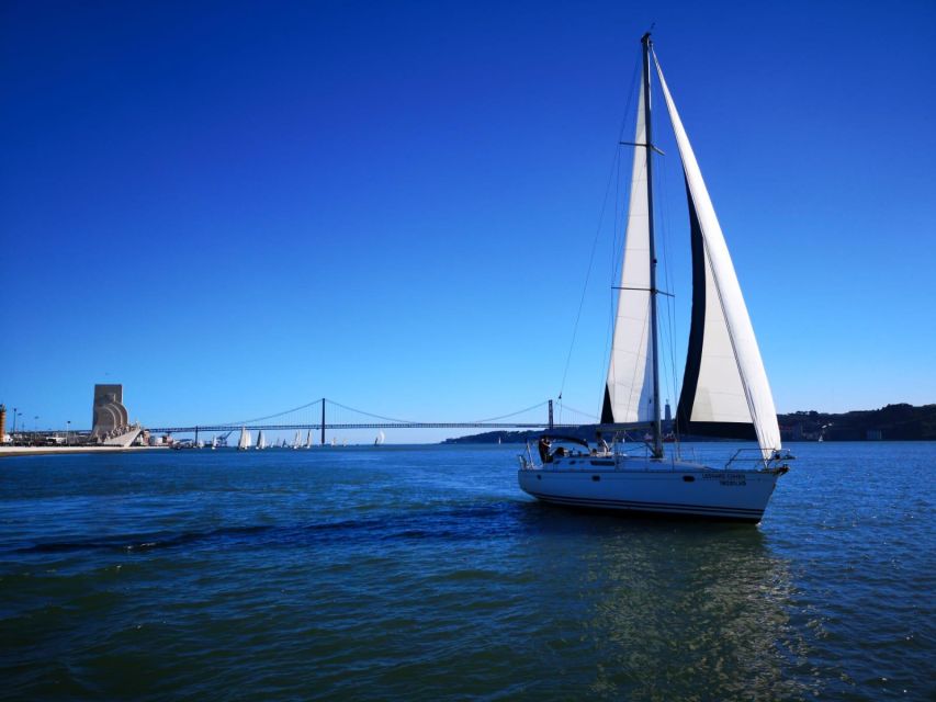 Lisbon: Yacht Sailing Tour With Portuguese Wine and History - Cristo Rei and the river’s long perspective