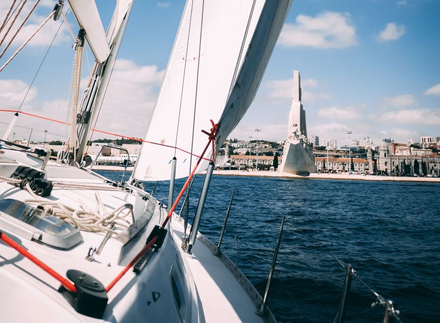 Lisbon: Yacht Sailing Tour With Portuguese Wine and History - The on-board feel: 12 meters, two crew members, and a captain’s wine moment