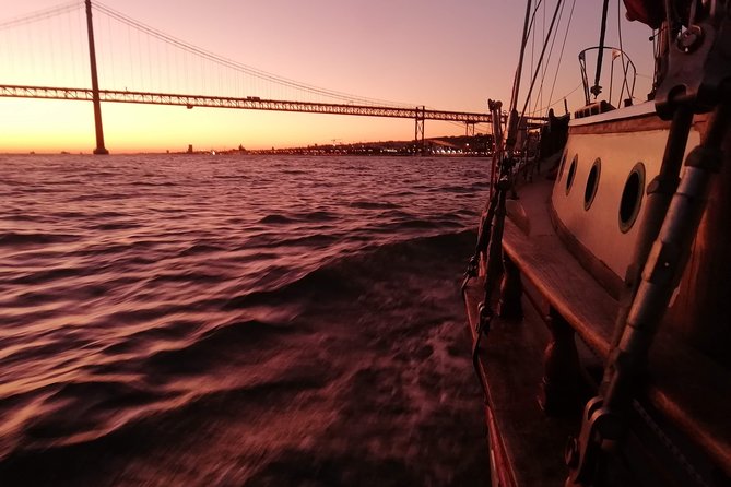 Marriage proposal on a Vintage Sailboat - Cristo Rei: the statue on the south bank, seen from the Tagus