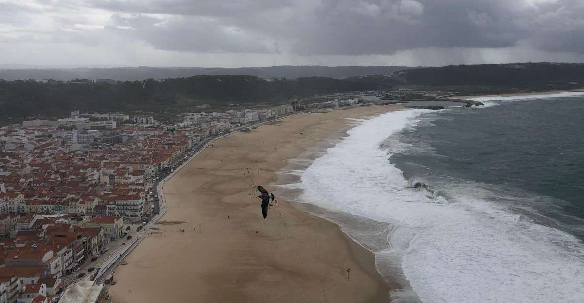 Nazaré: Big Wave Capital & Medieval Óbidos tour from Lisbon - From Cais do Sodré to Nazaré: the ride that sets the tone