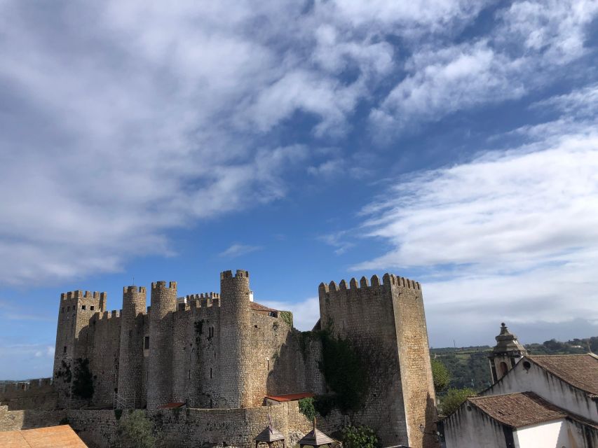 Nazaré: Big Wave Capital & Medieval Óbidos tour from Lisbon - Watching the ocean work: what you can do with 1.5 hours of free time