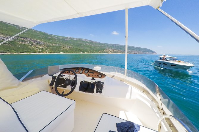 Ocean Bliss: Full Day Arrábida Private Yacht Tour from Lisbon - Sesimbra from the water: a castle moment without the hike