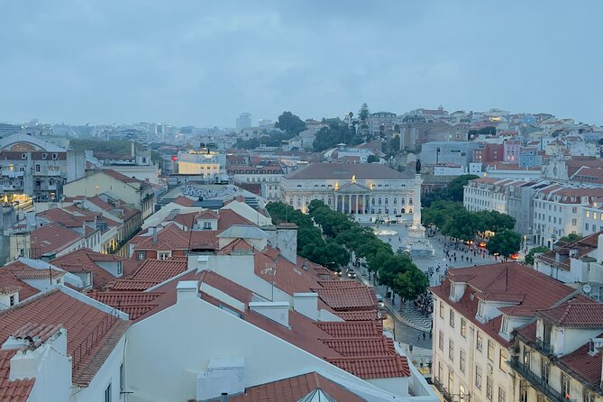 Private 6 or 10 Food Tasting and City Highlights Tour in Lisbon - Rua Augusta and Praca Dom Pedro IV: big views, quick turns, and crowd control
