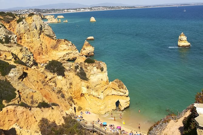 Private Algarve: Benagil Caves, Lagos Cliffs & Hidden Beaches - Praia dos Estudantes: A Cliff Tunnel Beach With a Roman-Style Bridge