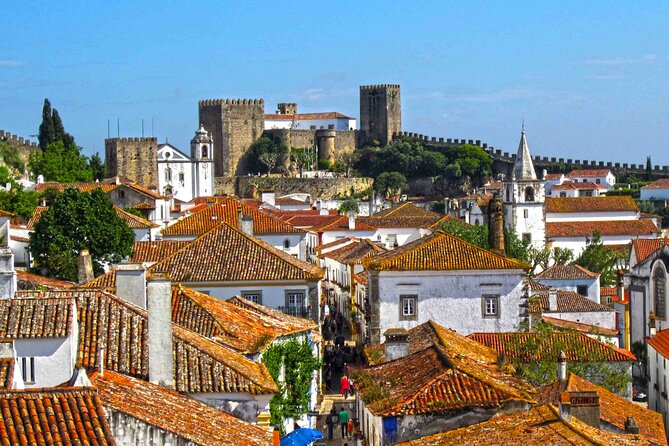Private day tour Fatima and Obidos from Lisbon - Stop 3: Óbidos medieval walls, church stops, and ginja in a chocolate cup