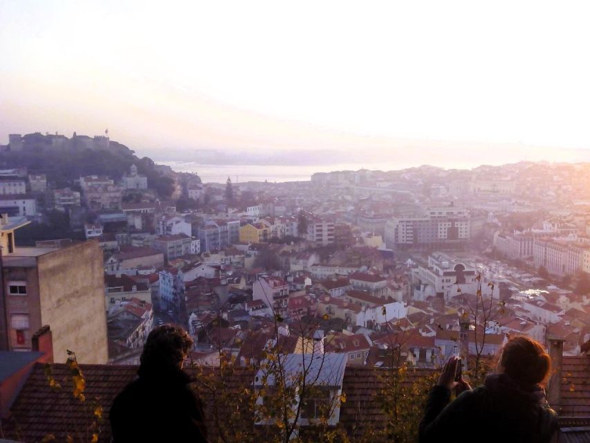 Private half-day Lisbon by Night Fado UNESCO Heritage &Views - Alfama at night: dinner, live Fado, and the neighborhood mood