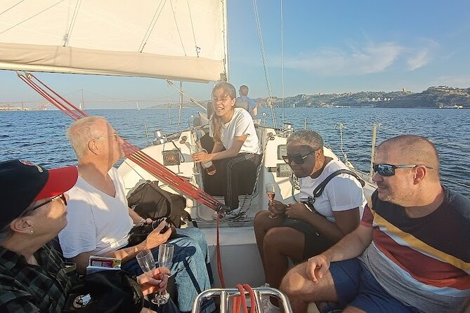 Private Lisbon Sailboat Tour with Welcome Drink - Onboard with Paulo and João: what the crew adds to the ride