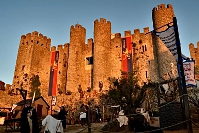 Private Lisbon to Fátima, Nazaré & Óbidos Tour – Spirit & Charm - Óbidos: medieval streets, castle walls, and the ginjinha ritual