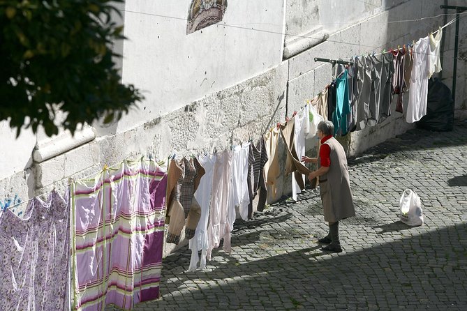 Private Lisbon Walking Tour - Climbing toward old Lisbon: Alfama views and the steep-lane puzzle