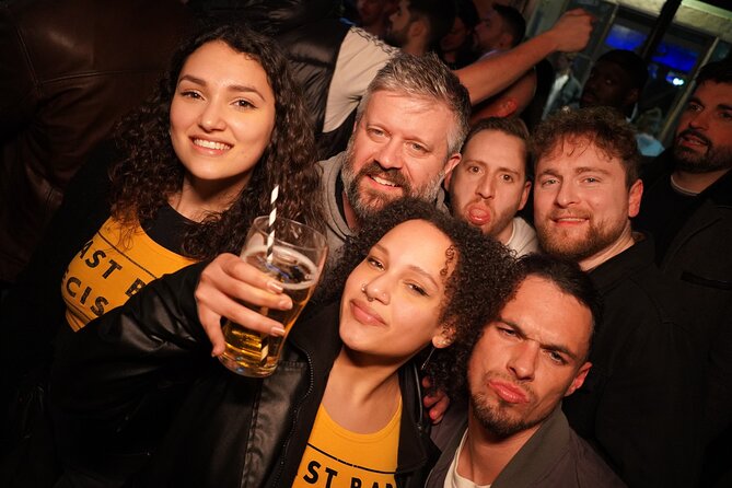 Private Pub Crawl in Lisbon - Stop 1: Bairro Alto Welcome Momentum (and a Free Shot)