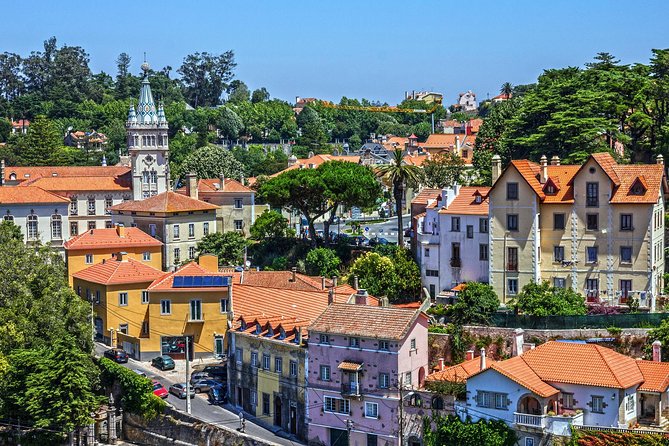 Private Sintra Tour from Lisbon with Regaleira Experience - Walking Sintra’s UNESCO center toward the Moorish castle views