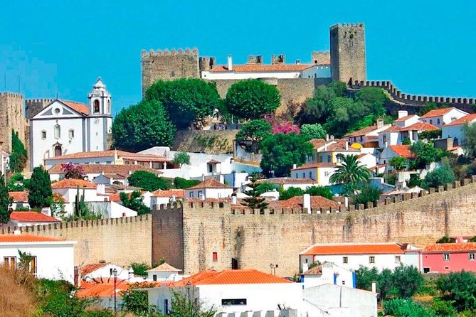 Private Tour Fatima-Batalha-Nazaré-Óbidos from Lisbon full day - Nazaré: giant waves, fishing-town vibe, and a lunch break