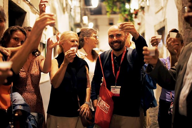 Private Tour: Lisbon Sunset Walking Tour with Fado Show and Dinner - Mouraria at Dusk: The Fado Crib and a Ginjinha Sour Cherry Break