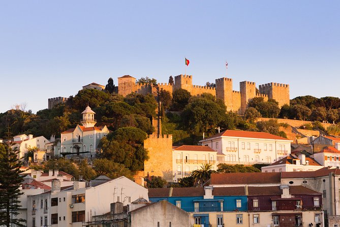 Private Tour: Lisbon Sunset Walking Tour with Fado Show and Dinner - Miradouro das Portas do Sol and Alfama at Night: Cobblestones, Moorish Echoes, and Fado’s Roots