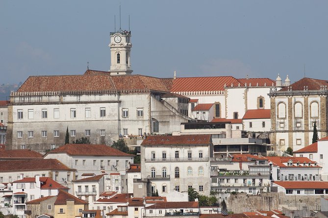 Private Transfer Lisbon-Porto with 2 (two) visits - Óbidos: medieval walls, candy-color streets, and an easy win