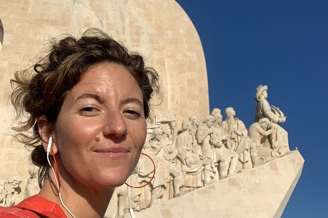 Riverside Ride Audio Adventure Lisbon to Belem - The riverside bike path: docks, trains, and bridge views