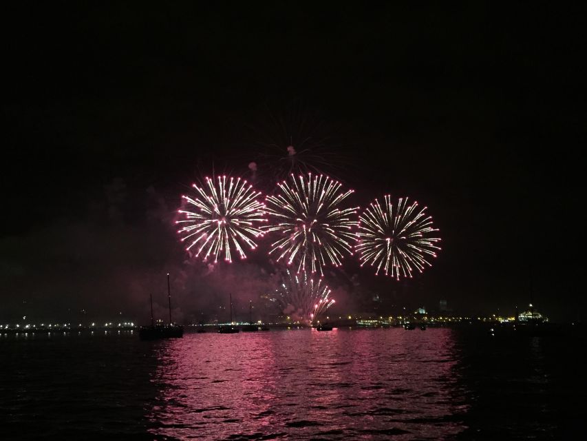 Sail into 2026: Lisbon Fireworks from the River - The NYE moment: sparkling wine, raisins, and fireworks in front of Commerce Square