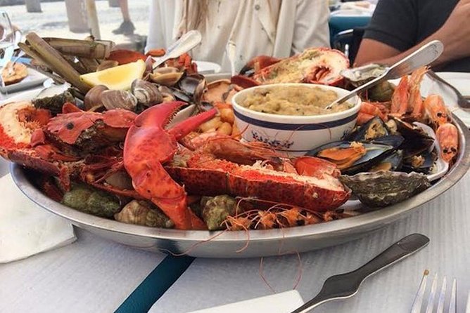 Senior Tourism: Gastronomic and cultural experience near Lisbon - Ericeira for surf reserve views, or Sesimbra for a fishing vibe