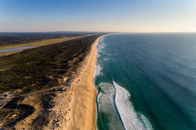 Setubal & Comporta Trip with Horseback Riding from Lisbon - Troia by ferry: sea views, long sand, and dolphin odds